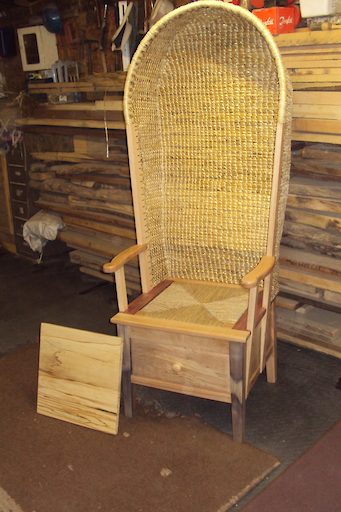 Gents Hooded Orkney chair with a drawer in natural driftwood with removable sea grass and solid seats